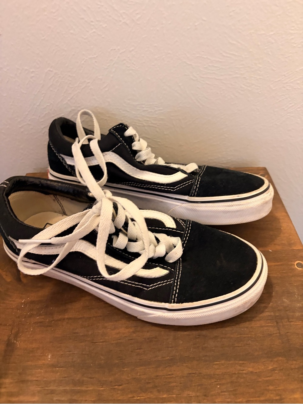 Women’s Black and White Classic Low-Top Vans Sneakers
